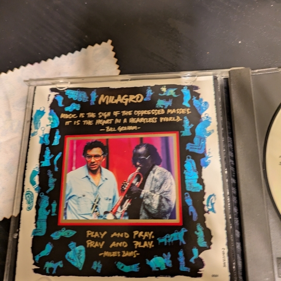 Milagro CD - Black and Blue - Picture 4 of 6